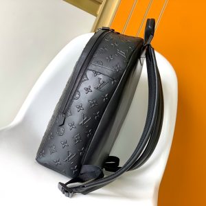 Alternative view of p750Armand Backpack crafted from Monogram Seal calf leather Its refined texture accentuates Louis Vuitton's iconic embossed pattern Recreating the distinctive charm of vintage letter seals Spacious interior with compartments and tablet sleeve Organizes belongings with precision Size: 31x42x15cm